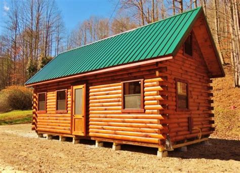 The sleeping loft with a nice window that opens. . Trophy amish cabins price list